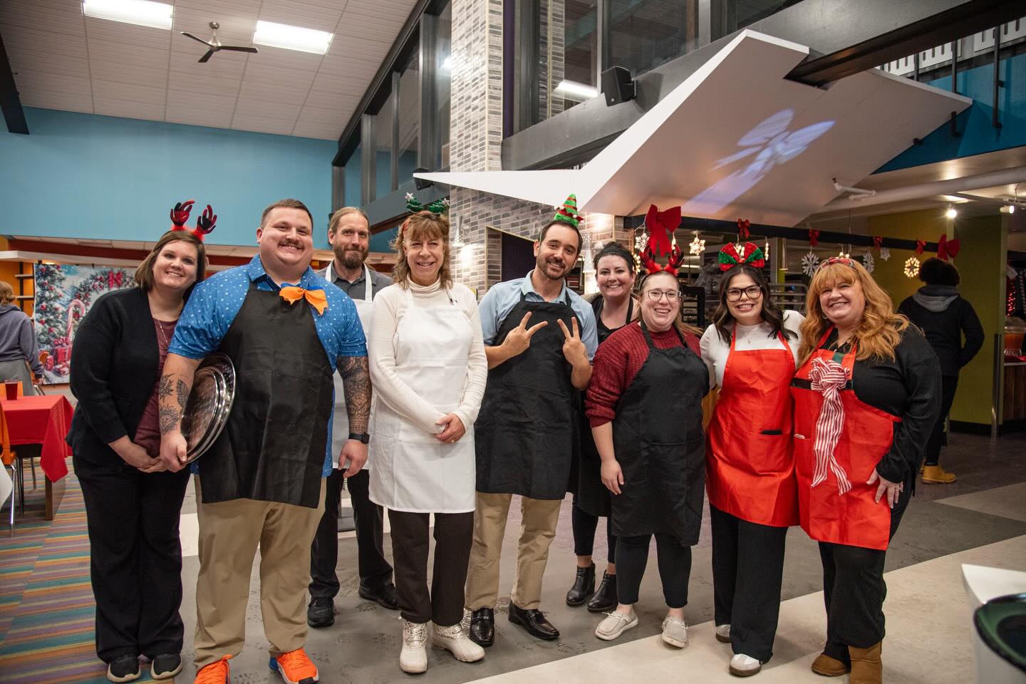 Staff ready to serve students at the 2025 Holiday Dinner.
