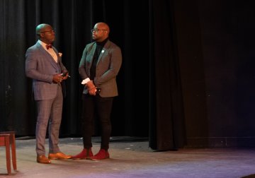 Dr. Anthony Baird talks with Dr. Frederick Engram in Strebel Auditorium on February 1, 2023.