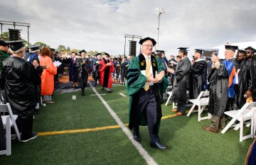 Todd Pfannestiel begins procession out after inauguration ceremony 2023.