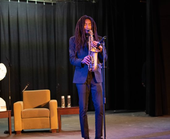 Craig Beacham plays saxophone in Strebel Auditorium on February 1, 2023.