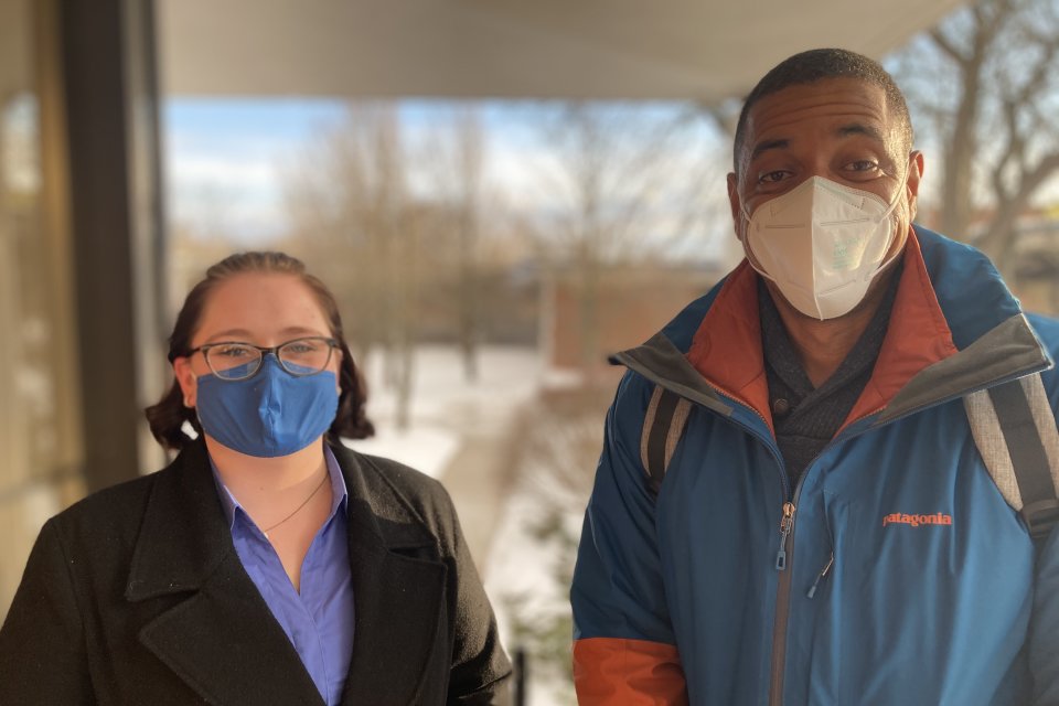 Students Erin Taylor and Stacey Webb smiling behind their masks.