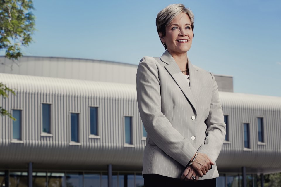 President Laura Casamento stands in front of the ECJS building.